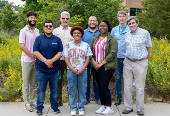 A group of students poses with ORNL staff